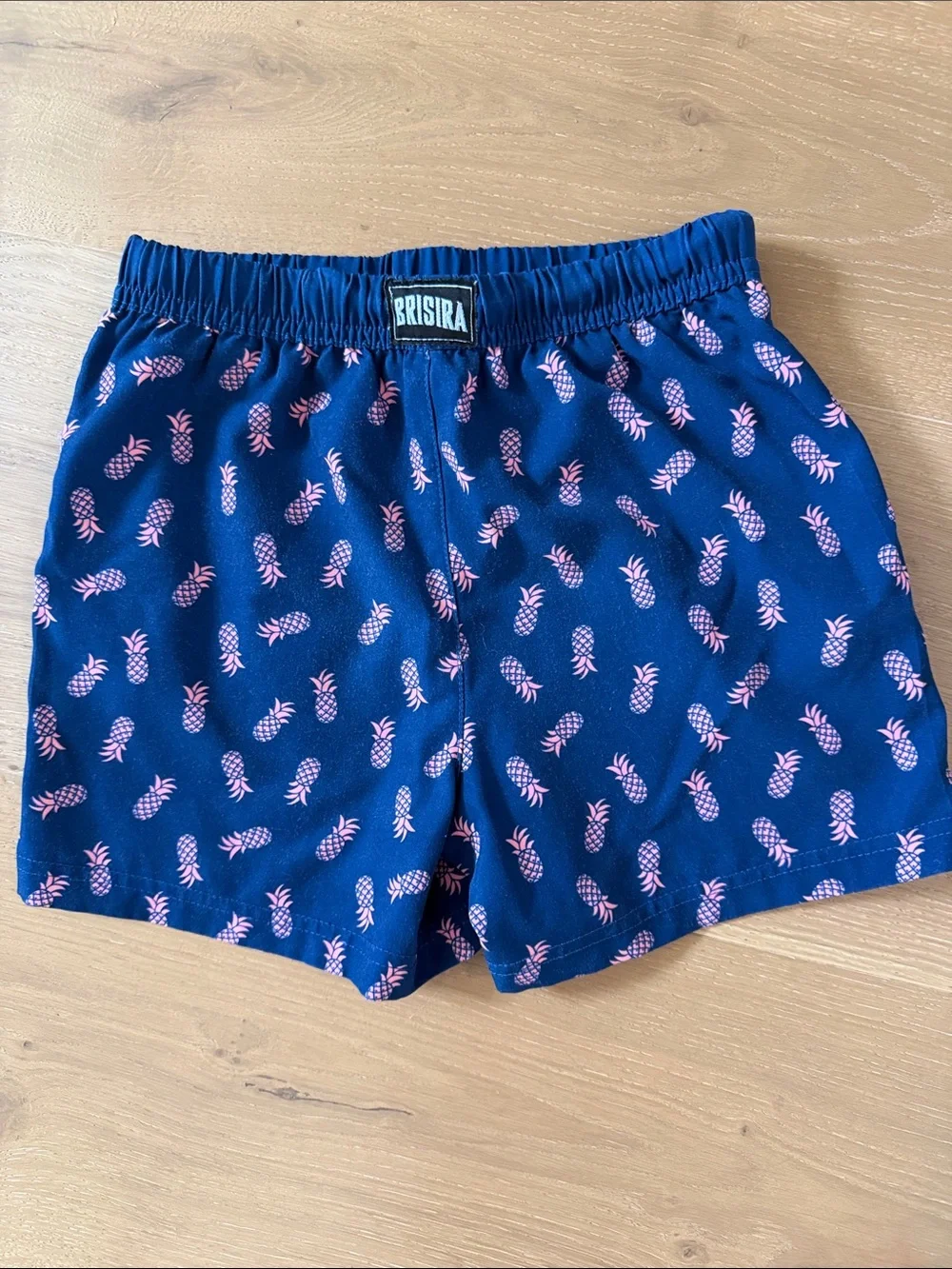 Kids Navy Swim Trunks with Pink Pineapple Print